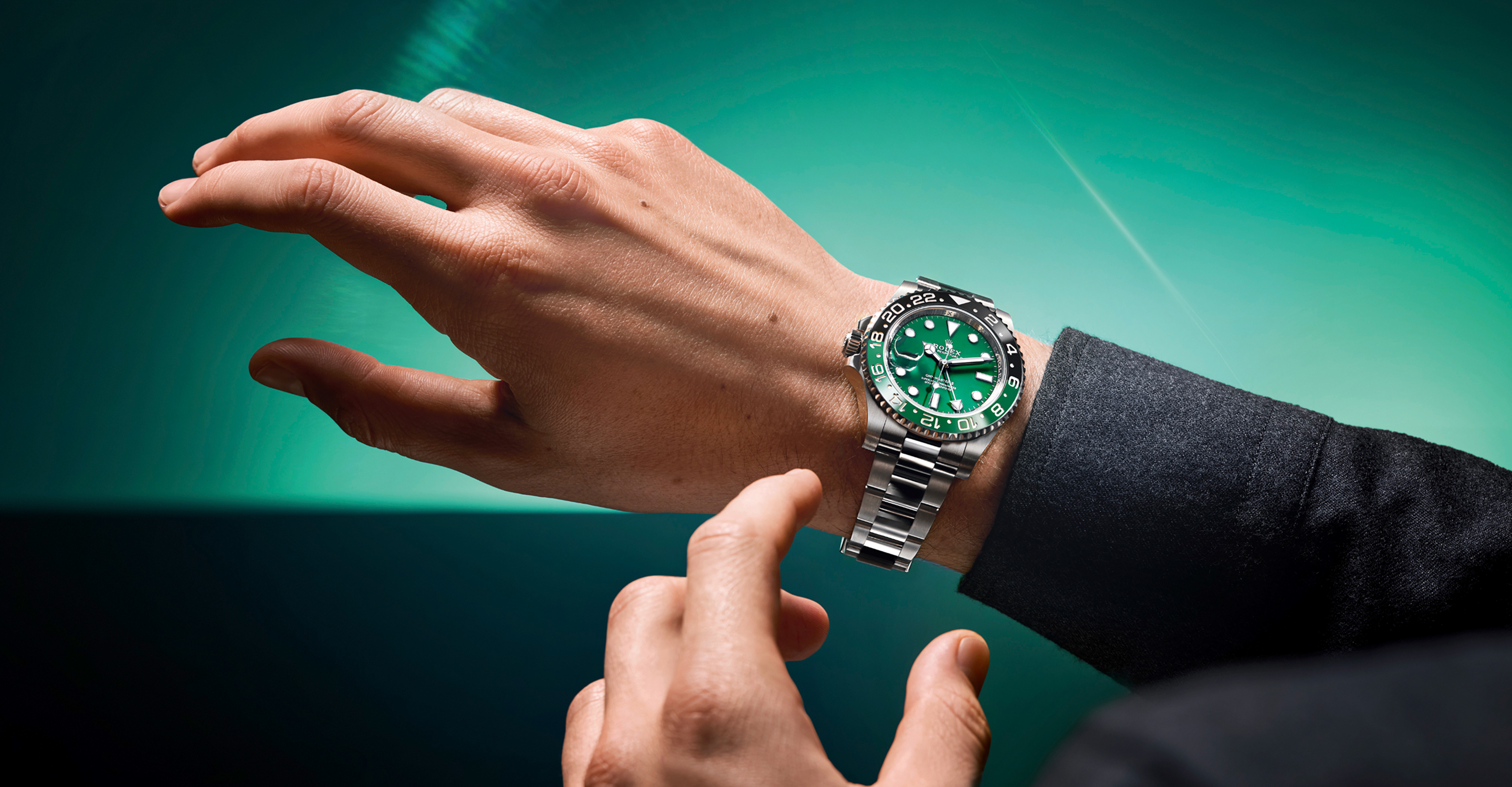 Close up of Rolex GMT-Master 2 watch on a mans wrist