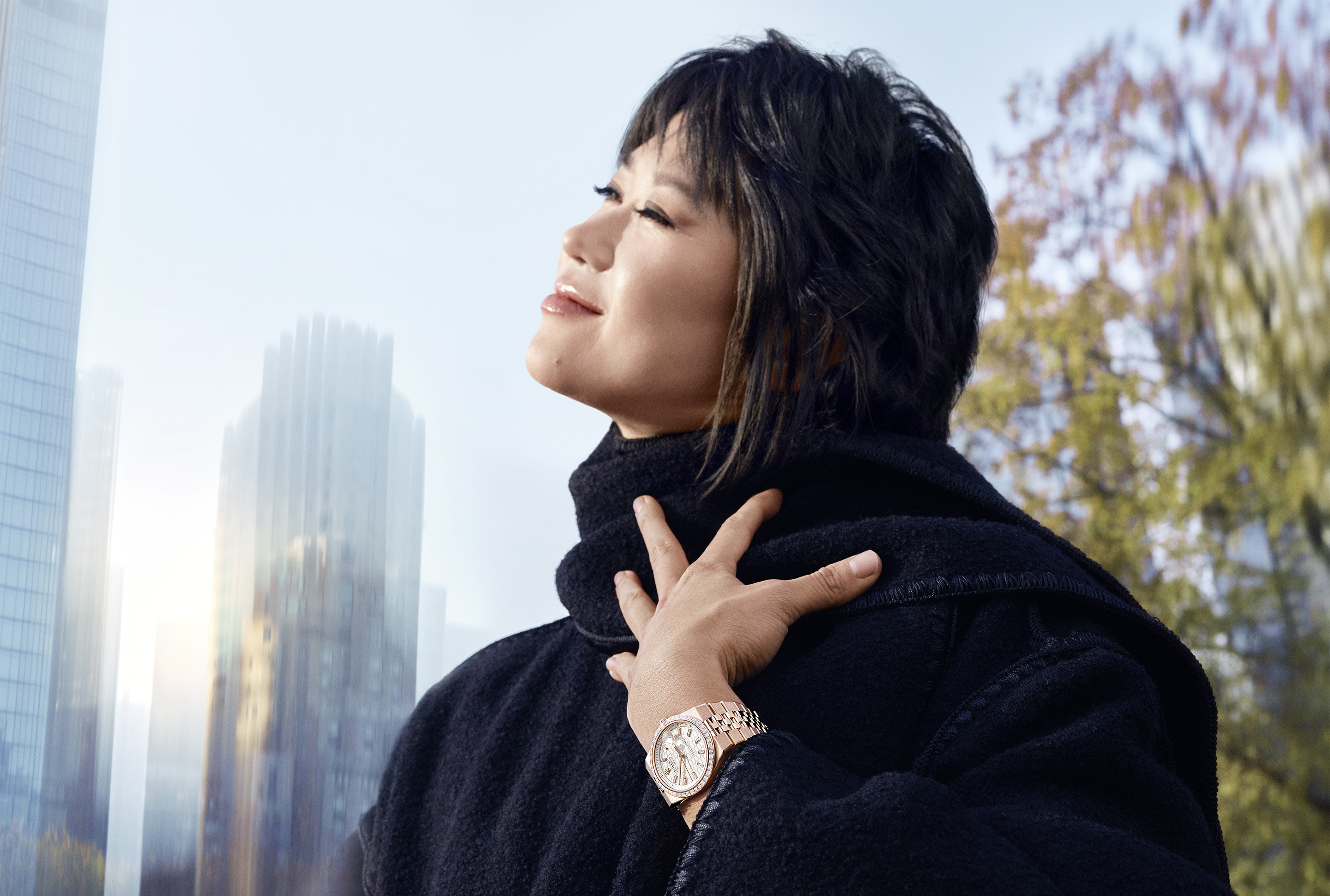 Image of a woman wearing the Rolex Land-Dweller watch