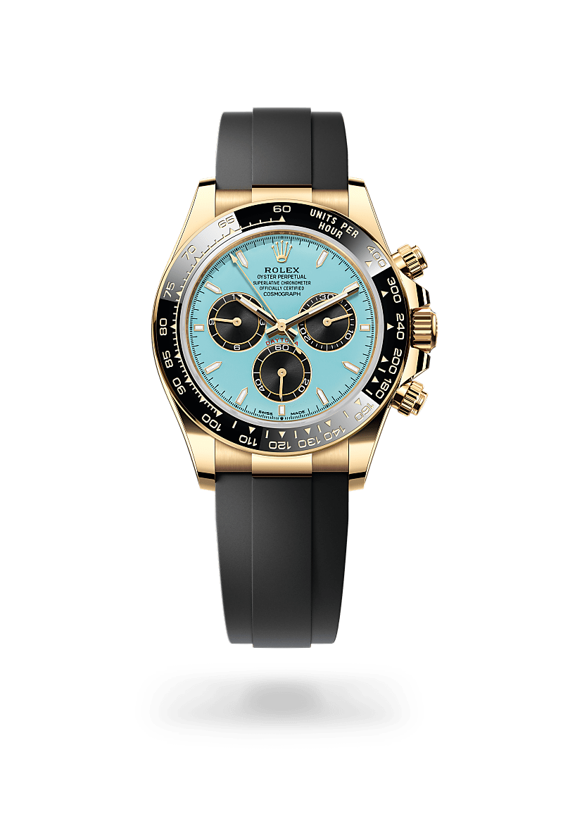 Rolex Cosmograph Daytona in yellow gold with an Turquoise blue and black dial, Black monobloc Cerachrom bezel in ceramic with moulded tachymetric scale bezel, and Oyster bracelet