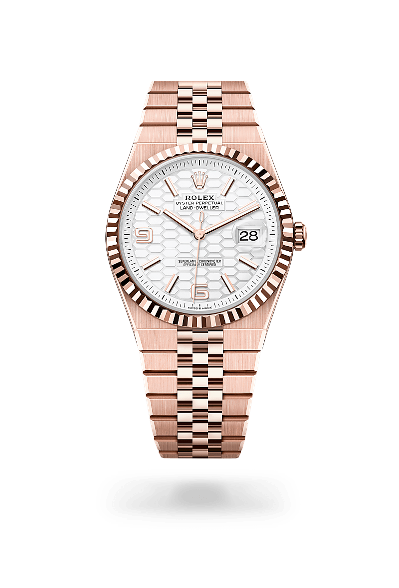 Rolex Land-Dweller 40 in Everose gold with an Intense white, honeycomb motif dial, Fluted bezel, and Oyster bracelet