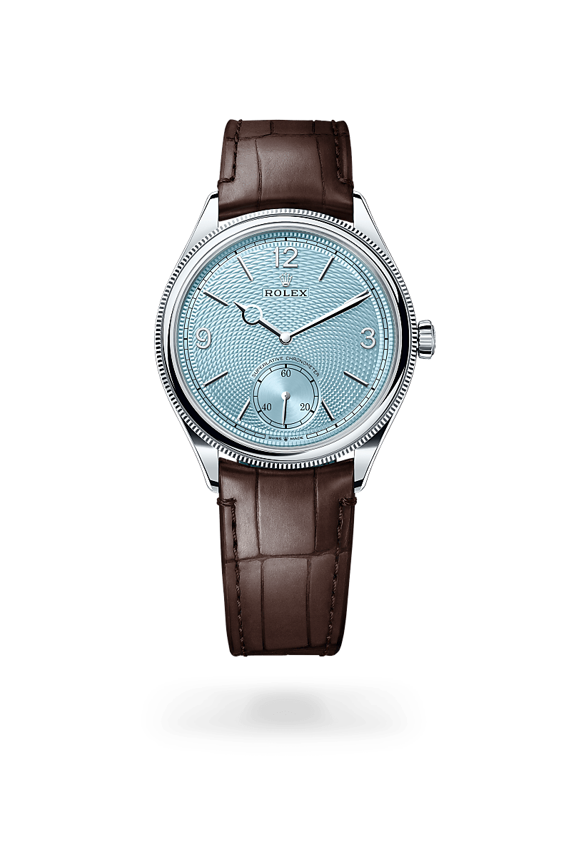 Rolex 1908 in polished finish with an Ice blue, rice-grain motif dial, Domed and fluted bezel, and 39 mm bracelet