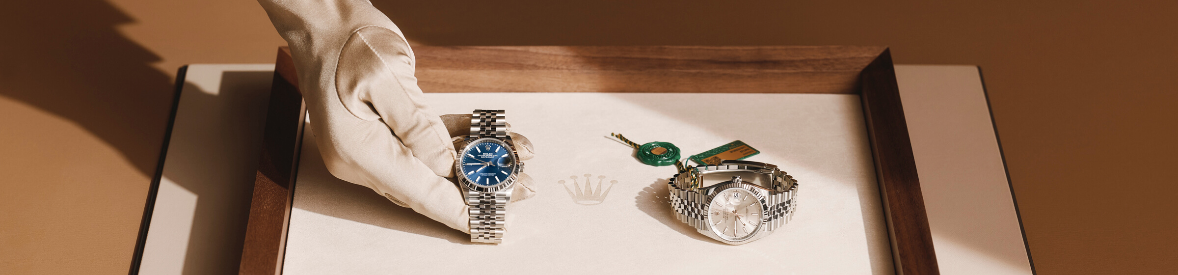 Image of man showing watches