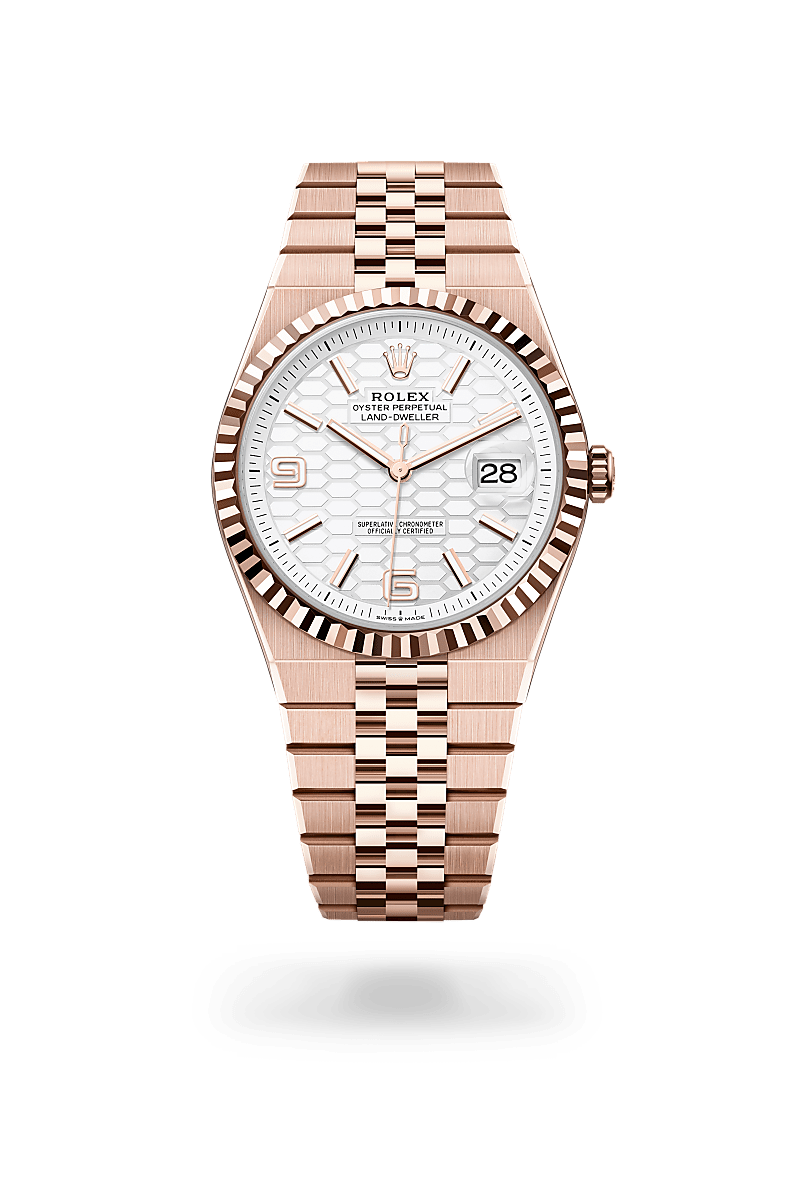 Rolex Land-Dweller 40 in Everose gold with an Intense white, honeycomb motif dial, Fluted bezel, and Oyster bracelet