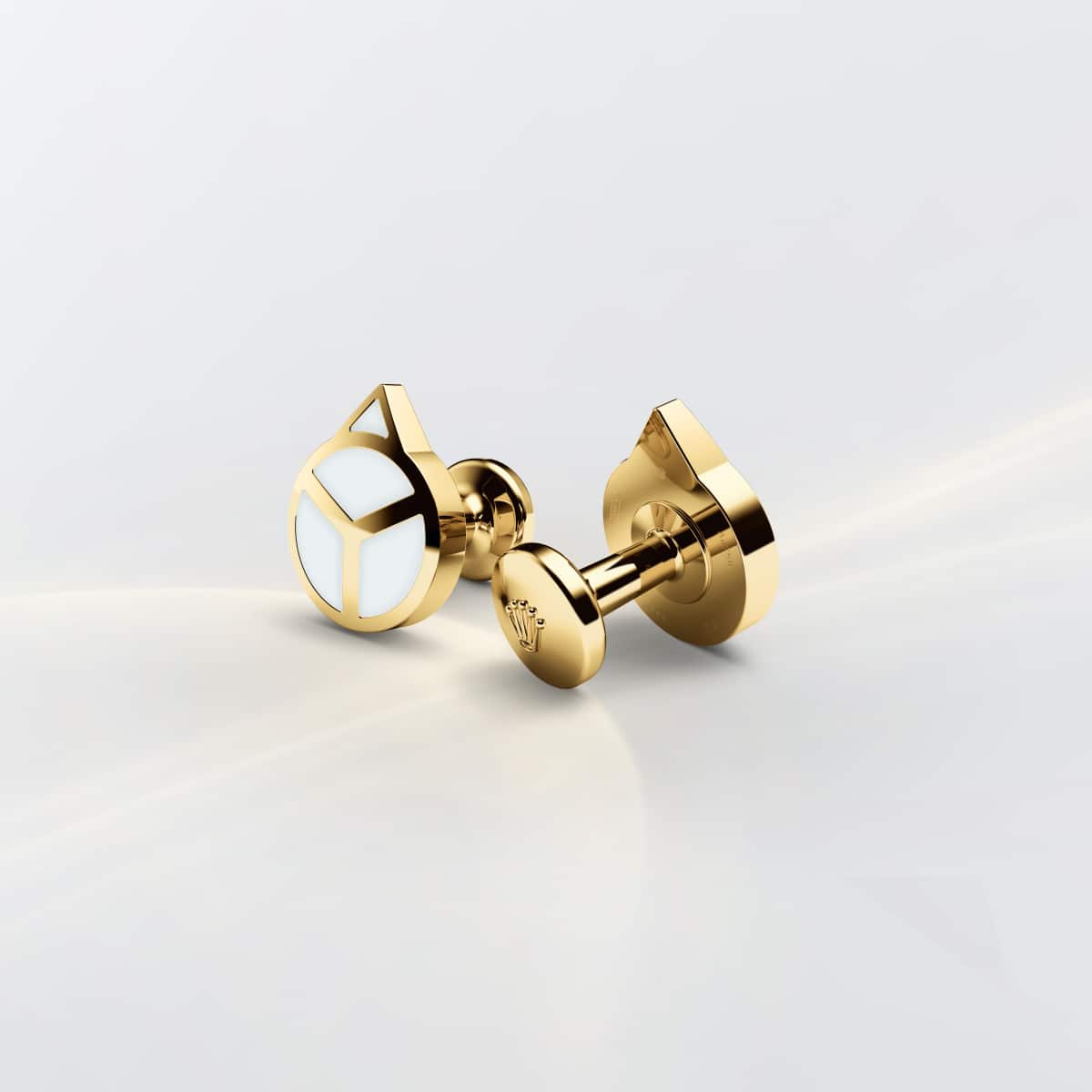Rolex ‘Hand’ cufflinks in Yellow gold and luminescent material