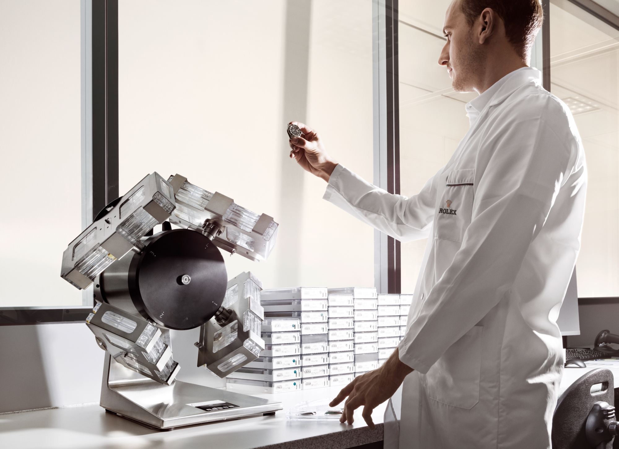 Image of watchmaker testing a Rolex watch