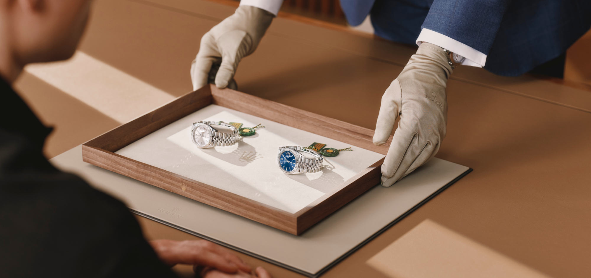 Rolex dealer assisting customer