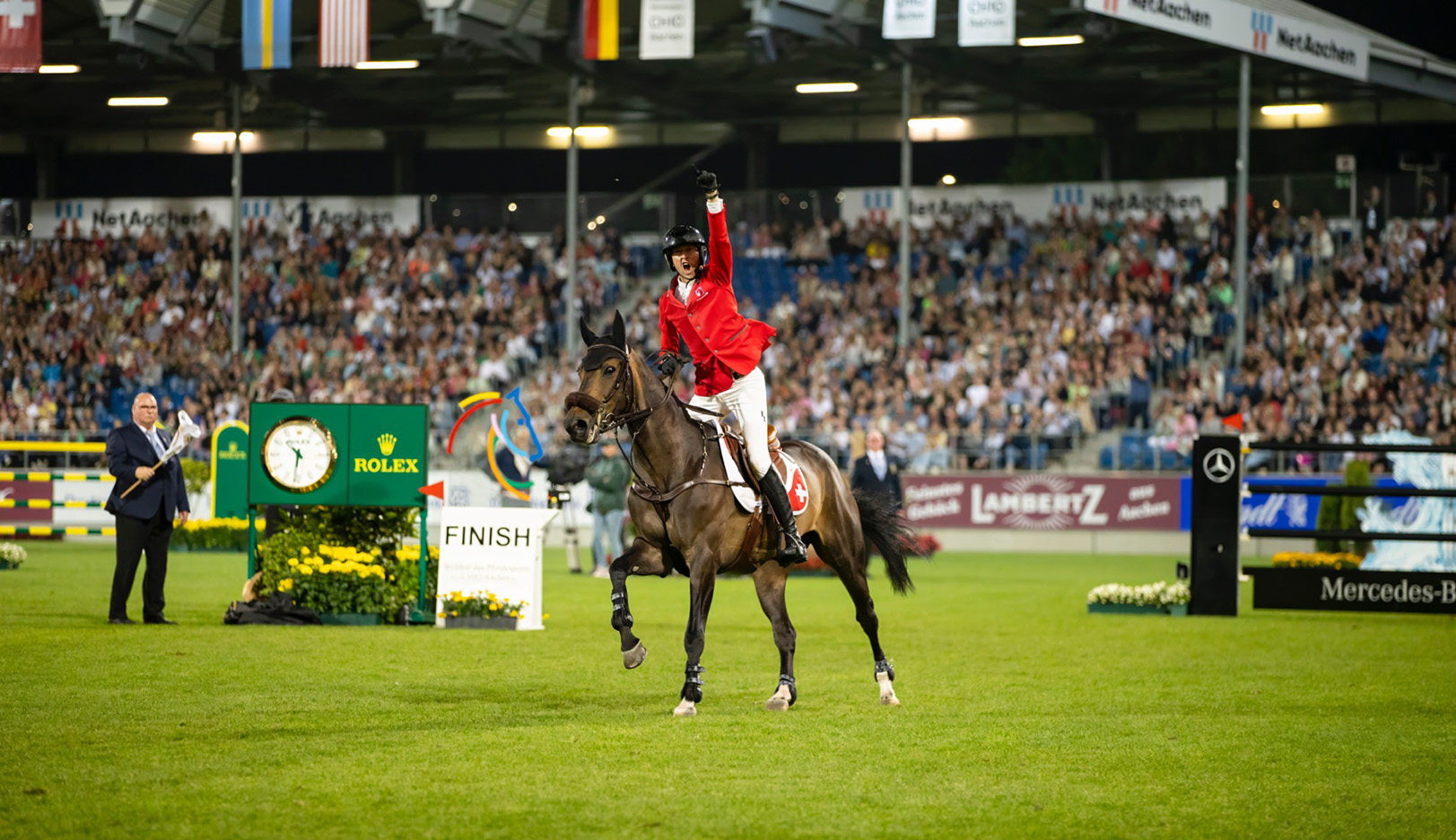 A man celebrating victory on a horse